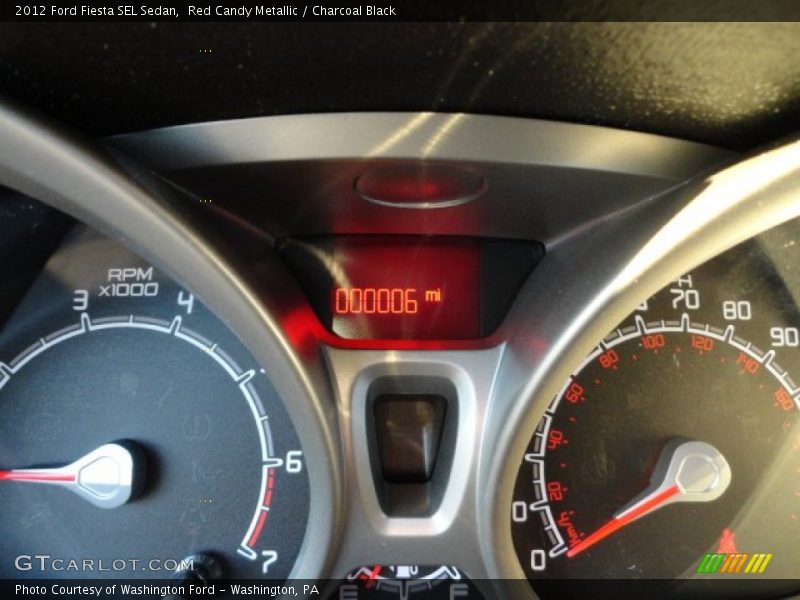 Red Candy Metallic / Charcoal Black 2012 Ford Fiesta SEL Sedan