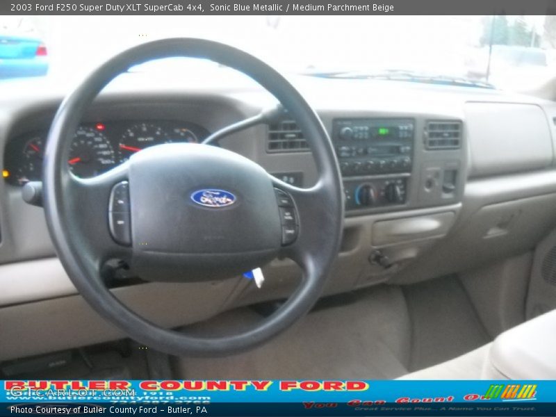 Sonic Blue Metallic / Medium Parchment Beige 2003 Ford F250 Super Duty XLT SuperCab 4x4