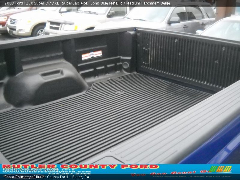 Sonic Blue Metallic / Medium Parchment Beige 2003 Ford F250 Super Duty XLT SuperCab 4x4
