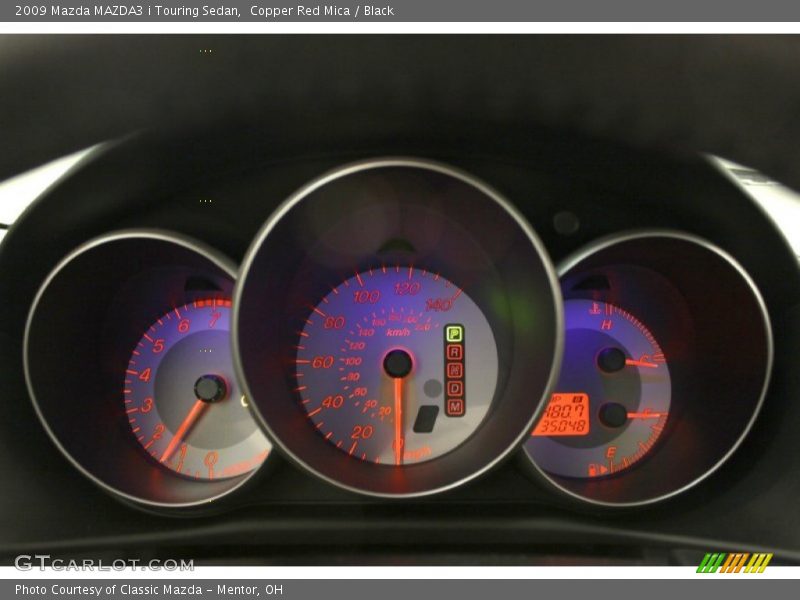 Copper Red Mica / Black 2009 Mazda MAZDA3 i Touring Sedan