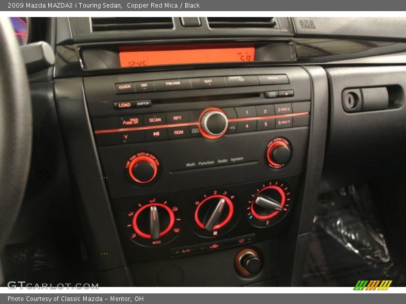 Copper Red Mica / Black 2009 Mazda MAZDA3 i Touring Sedan