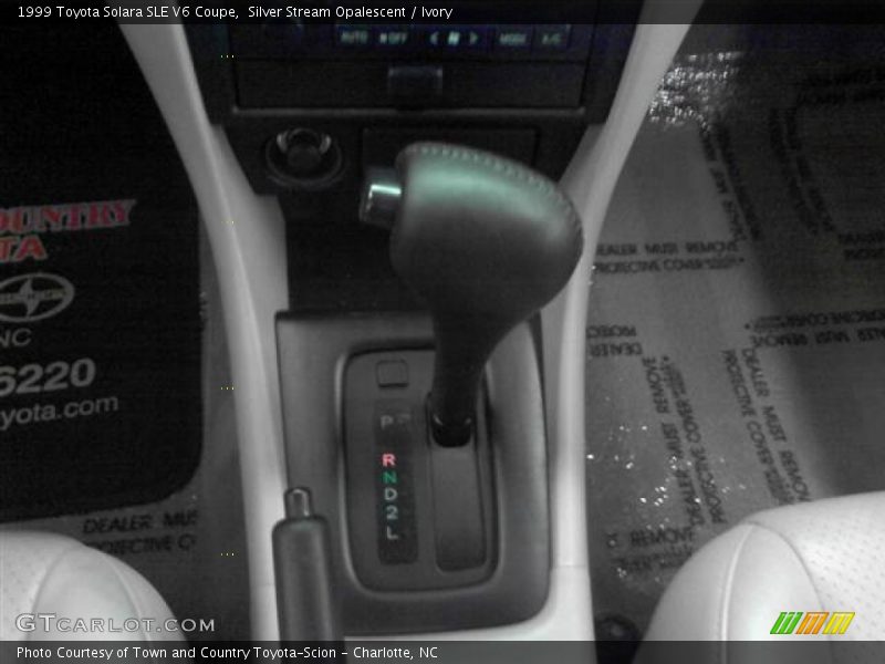 Silver Stream Opalescent / Ivory 1999 Toyota Solara SLE V6 Coupe