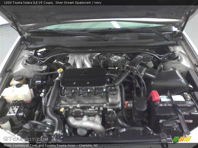 Silver Stream Opalescent / Ivory 1999 Toyota Solara SLE V6 Coupe