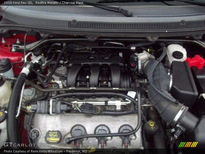 Redfire Metallic / Charcoal Black 2009 Ford Flex SEL