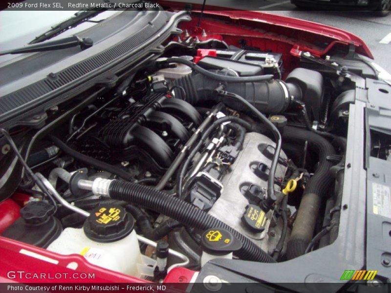 Redfire Metallic / Charcoal Black 2009 Ford Flex SEL