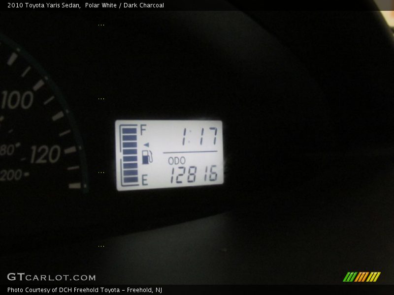 Polar White / Dark Charcoal 2010 Toyota Yaris Sedan