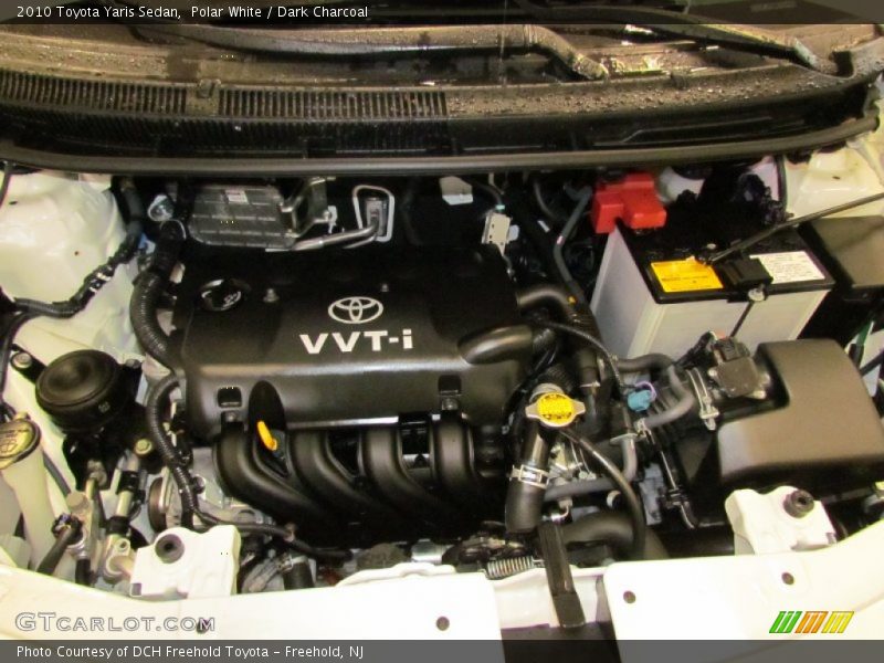 Polar White / Dark Charcoal 2010 Toyota Yaris Sedan