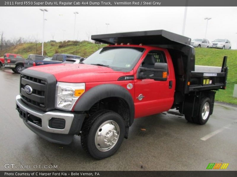 Front 3/4 View of 2011 F550 Super Duty XL Regular Cab 4x4 Dump Truck