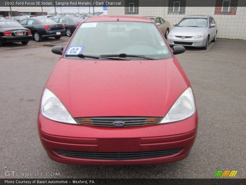 Sangria Red Metallic / Dark Charcoal 2002 Ford Focus SE Sedan