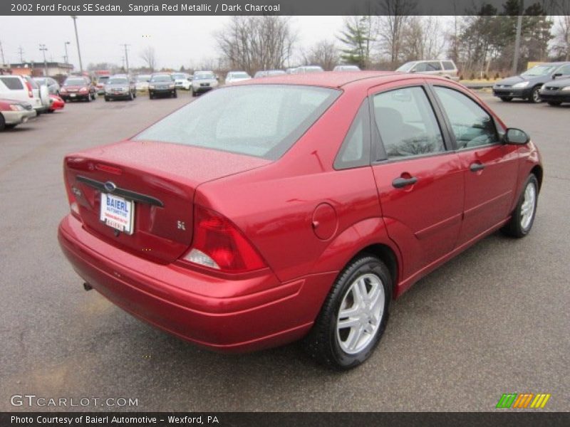 Sangria Red Metallic / Dark Charcoal 2002 Ford Focus SE Sedan