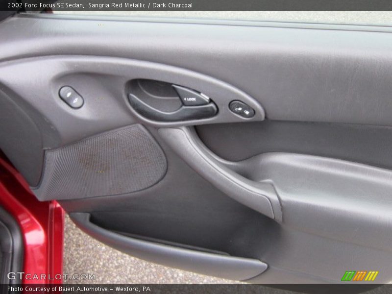 Sangria Red Metallic / Dark Charcoal 2002 Ford Focus SE Sedan