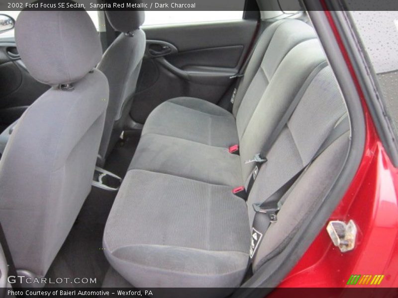 Sangria Red Metallic / Dark Charcoal 2002 Ford Focus SE Sedan