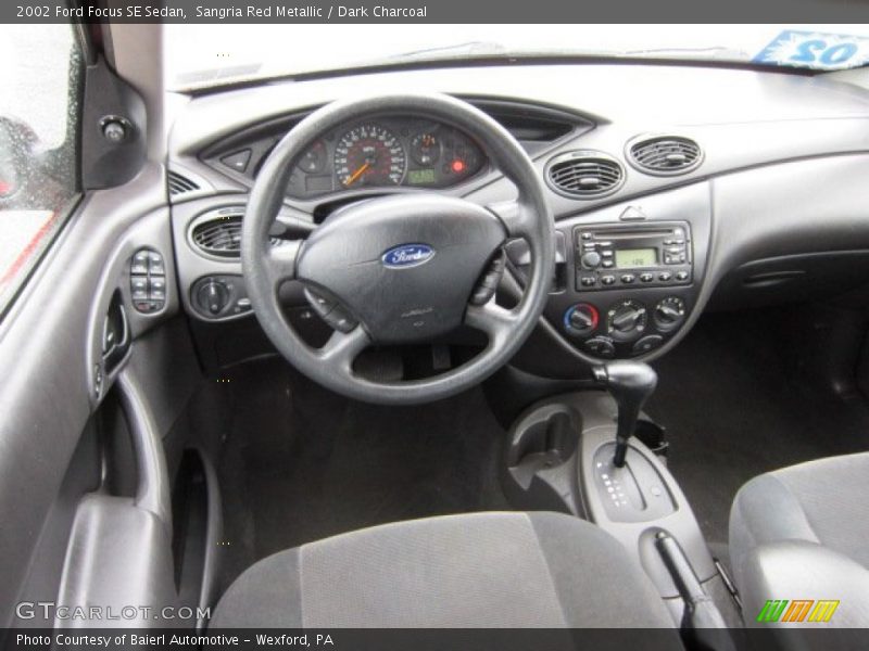 Sangria Red Metallic / Dark Charcoal 2002 Ford Focus SE Sedan