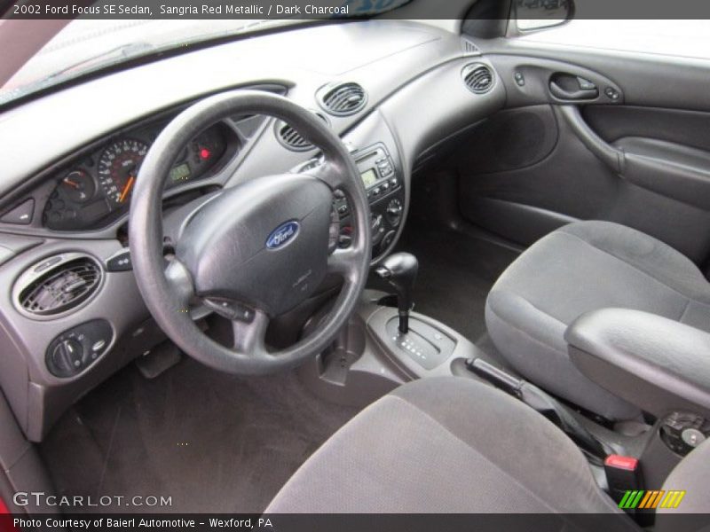 Sangria Red Metallic / Dark Charcoal 2002 Ford Focus SE Sedan