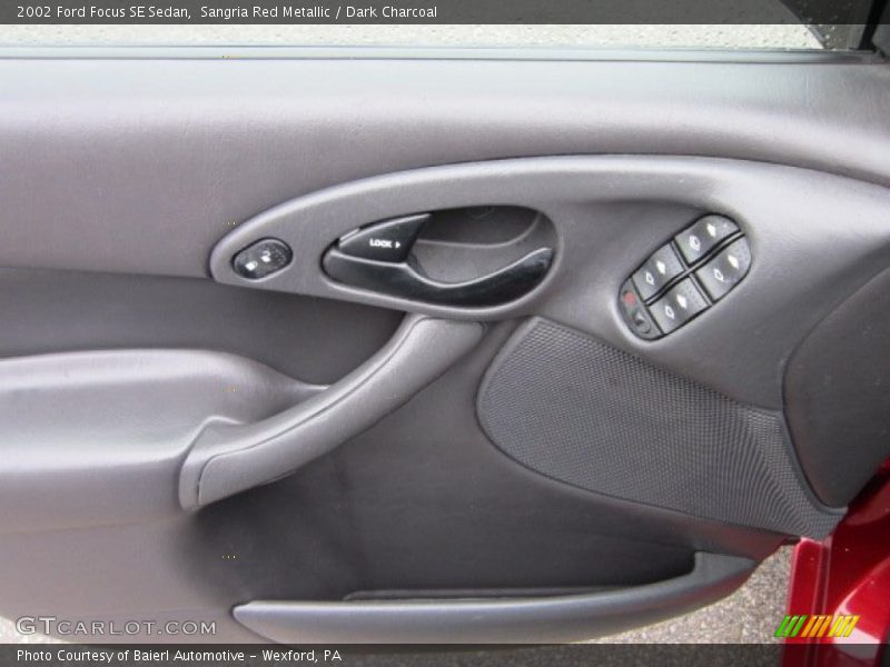 Sangria Red Metallic / Dark Charcoal 2002 Ford Focus SE Sedan