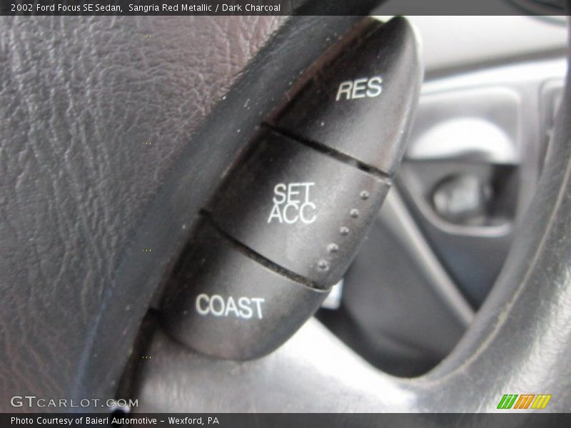 Sangria Red Metallic / Dark Charcoal 2002 Ford Focus SE Sedan