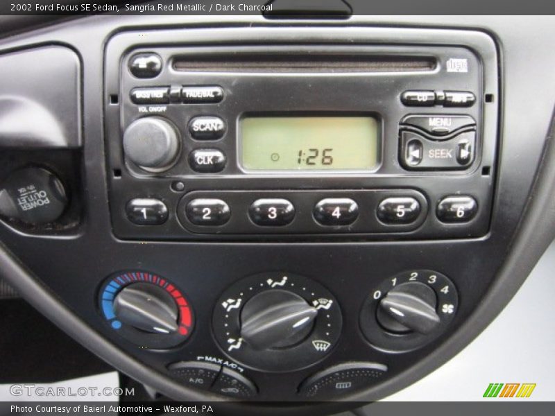 Sangria Red Metallic / Dark Charcoal 2002 Ford Focus SE Sedan