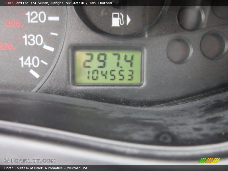 Sangria Red Metallic / Dark Charcoal 2002 Ford Focus SE Sedan