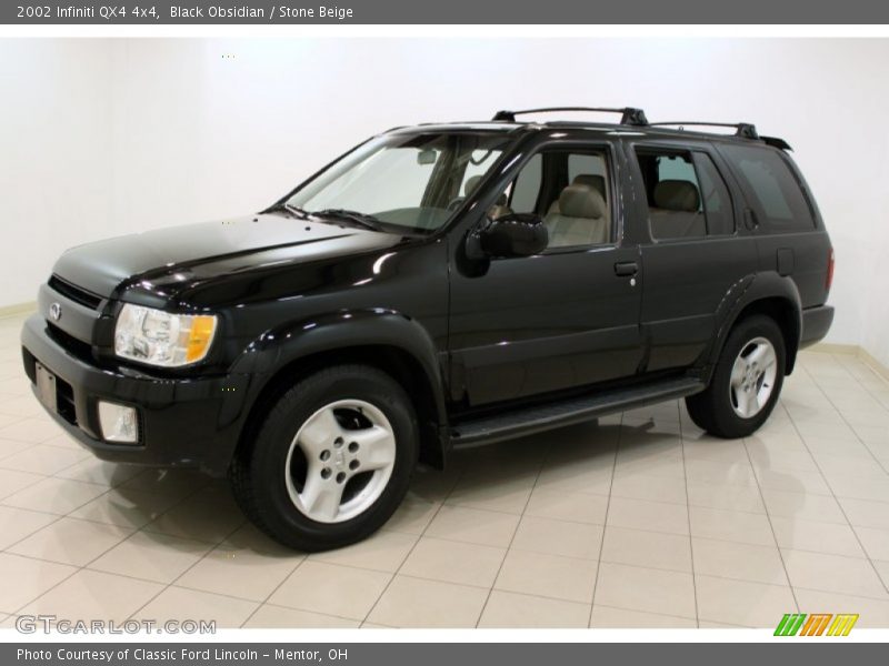 Black Obsidian / Stone Beige 2002 Infiniti QX4 4x4