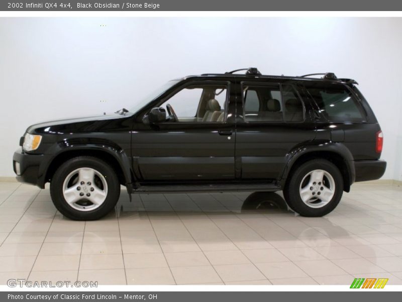 Black Obsidian / Stone Beige 2002 Infiniti QX4 4x4
