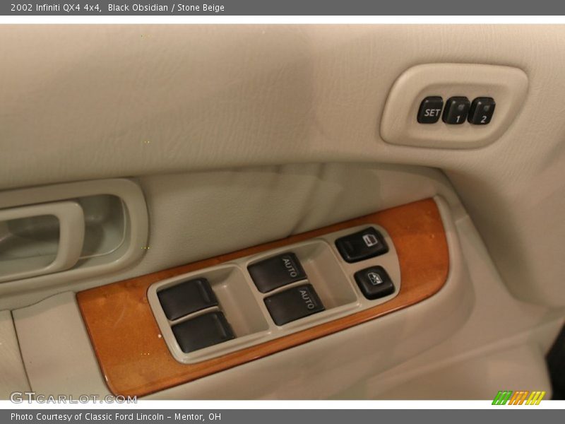 Black Obsidian / Stone Beige 2002 Infiniti QX4 4x4