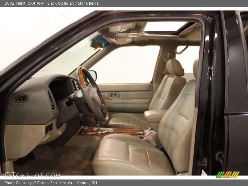 Black Obsidian / Stone Beige 2002 Infiniti QX4 4x4