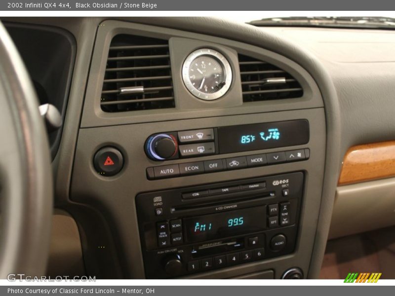 Black Obsidian / Stone Beige 2002 Infiniti QX4 4x4
