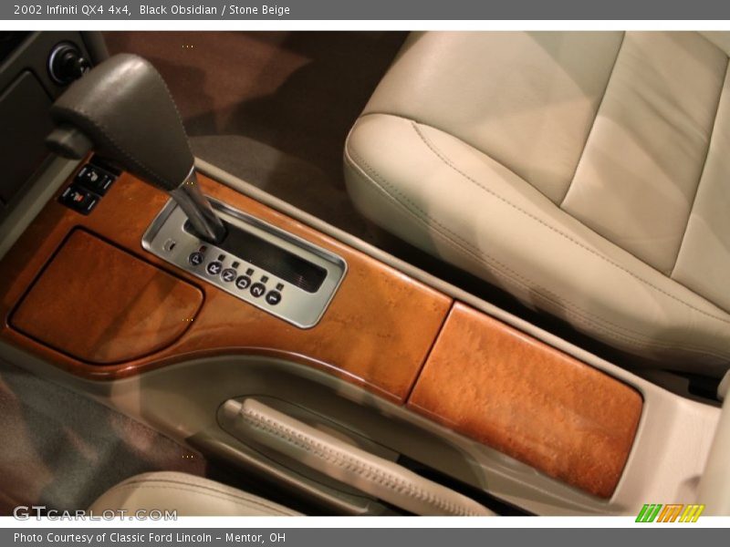 Black Obsidian / Stone Beige 2002 Infiniti QX4 4x4