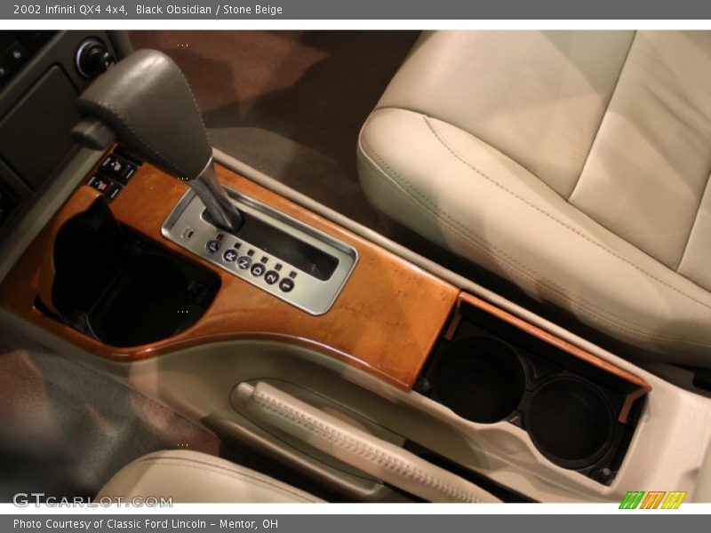 Black Obsidian / Stone Beige 2002 Infiniti QX4 4x4