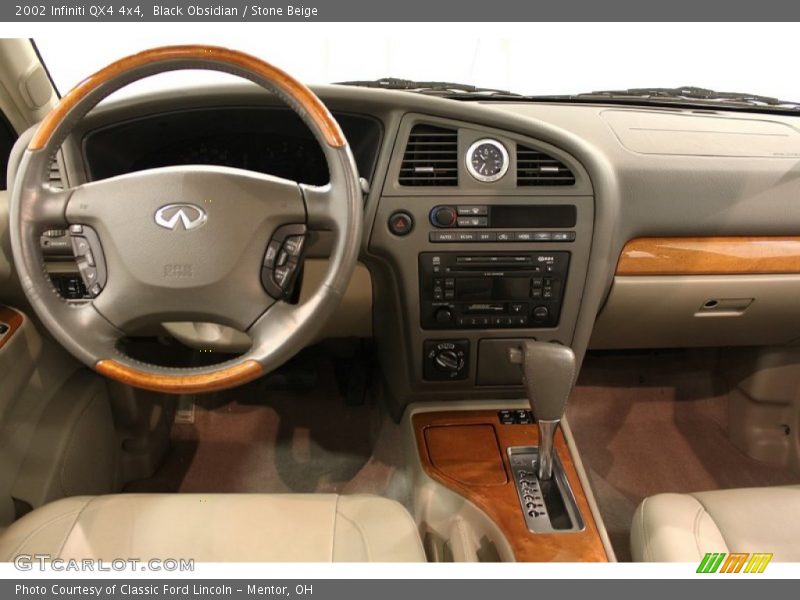 Black Obsidian / Stone Beige 2002 Infiniti QX4 4x4
