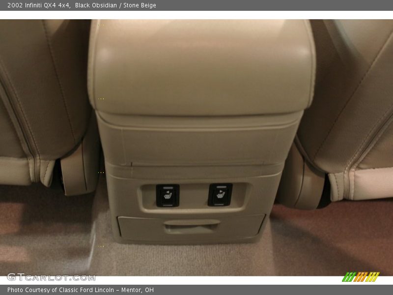 Black Obsidian / Stone Beige 2002 Infiniti QX4 4x4