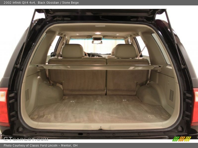 Black Obsidian / Stone Beige 2002 Infiniti QX4 4x4