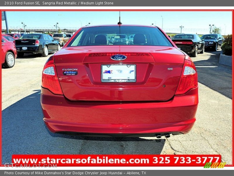 Sangria Red Metallic / Medium Light Stone 2010 Ford Fusion SE