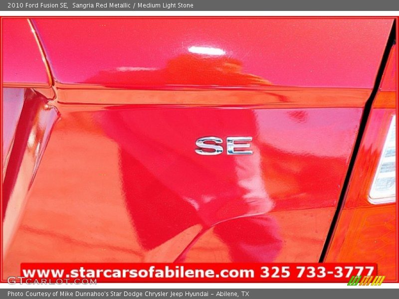 Sangria Red Metallic / Medium Light Stone 2010 Ford Fusion SE