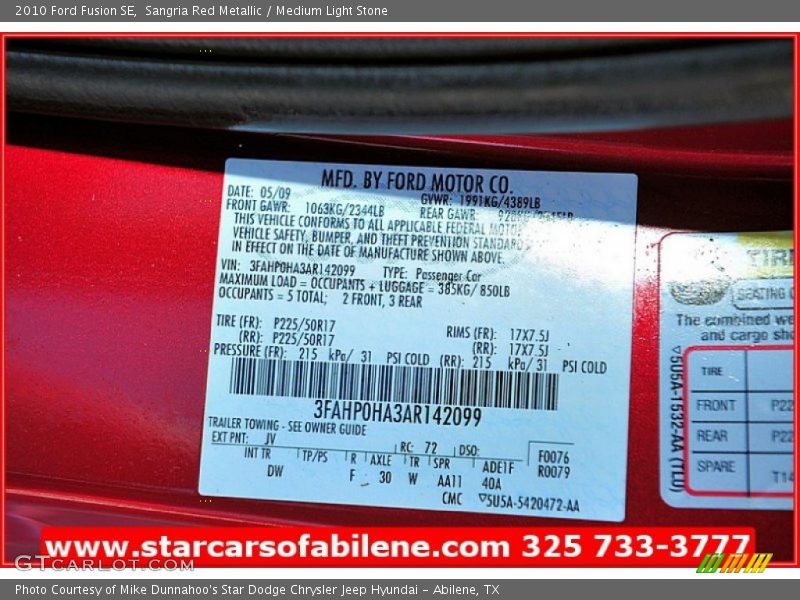 Sangria Red Metallic / Medium Light Stone 2010 Ford Fusion SE