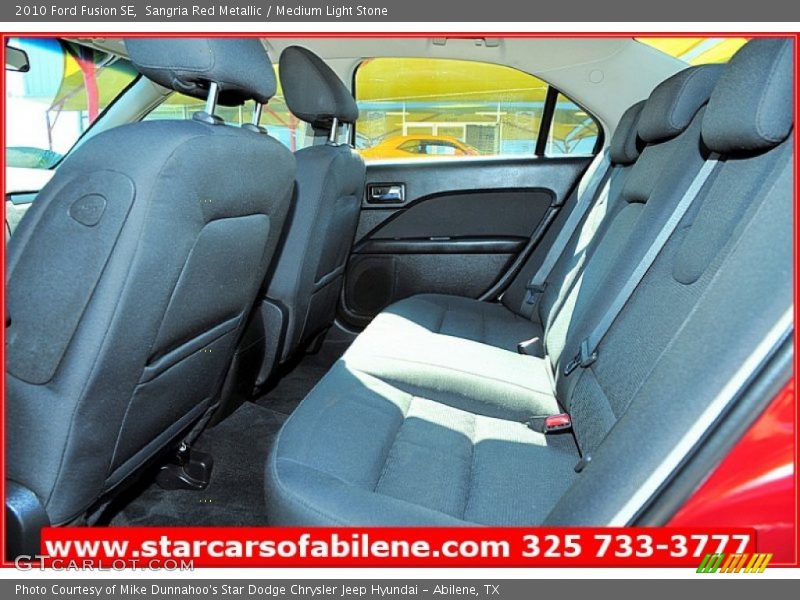Sangria Red Metallic / Medium Light Stone 2010 Ford Fusion SE