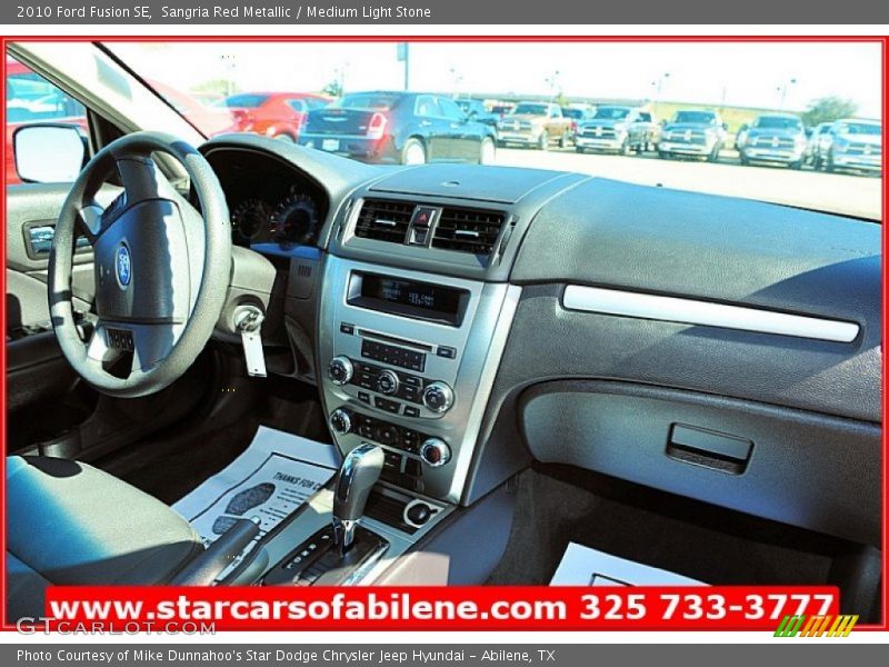 Sangria Red Metallic / Medium Light Stone 2010 Ford Fusion SE
