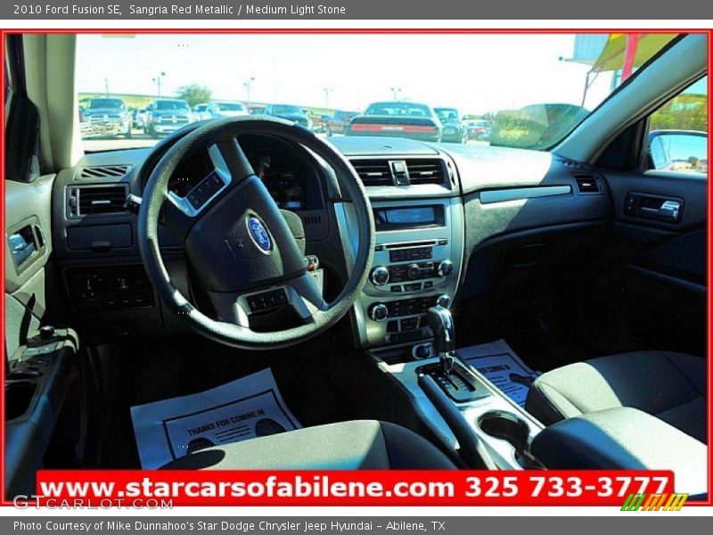 Sangria Red Metallic / Medium Light Stone 2010 Ford Fusion SE