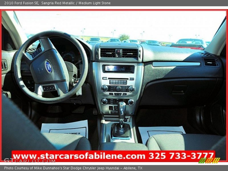 Sangria Red Metallic / Medium Light Stone 2010 Ford Fusion SE