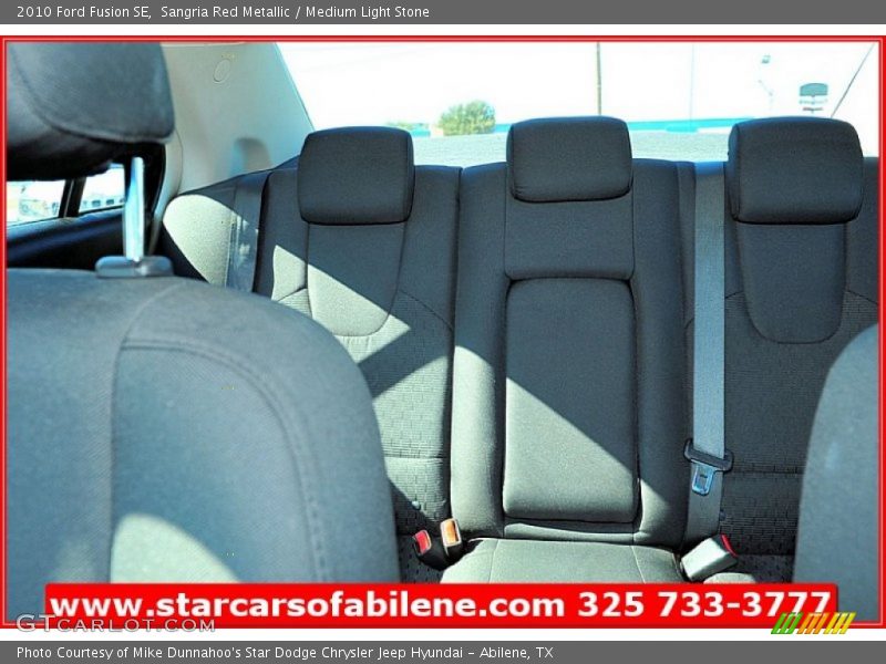 Sangria Red Metallic / Medium Light Stone 2010 Ford Fusion SE