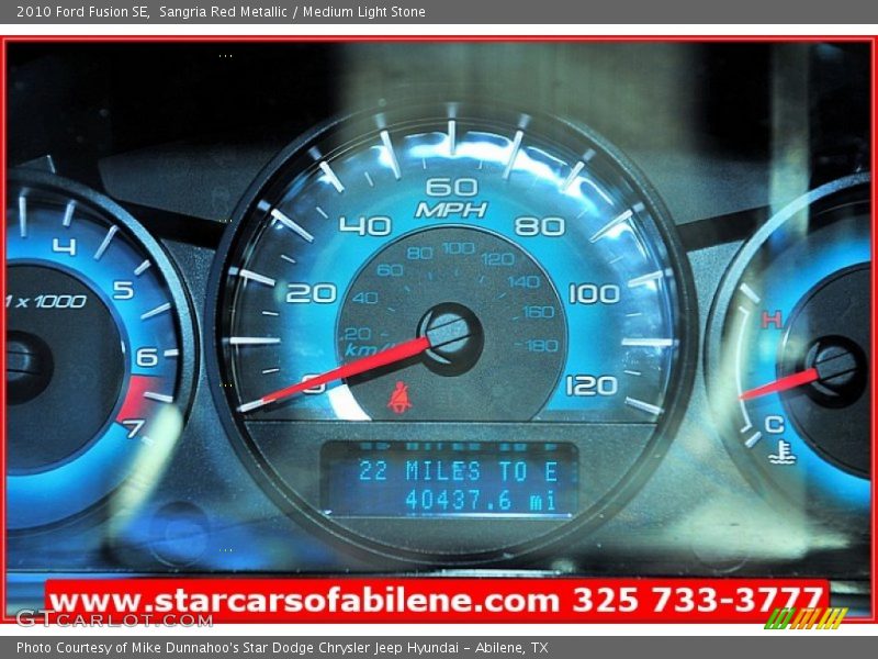 Sangria Red Metallic / Medium Light Stone 2010 Ford Fusion SE