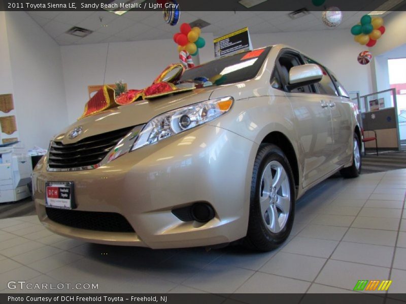 Sandy Beach Metallic / Light Gray 2011 Toyota Sienna LE