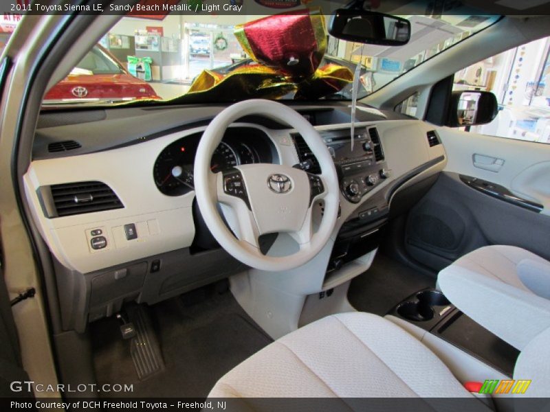 Sandy Beach Metallic / Light Gray 2011 Toyota Sienna LE