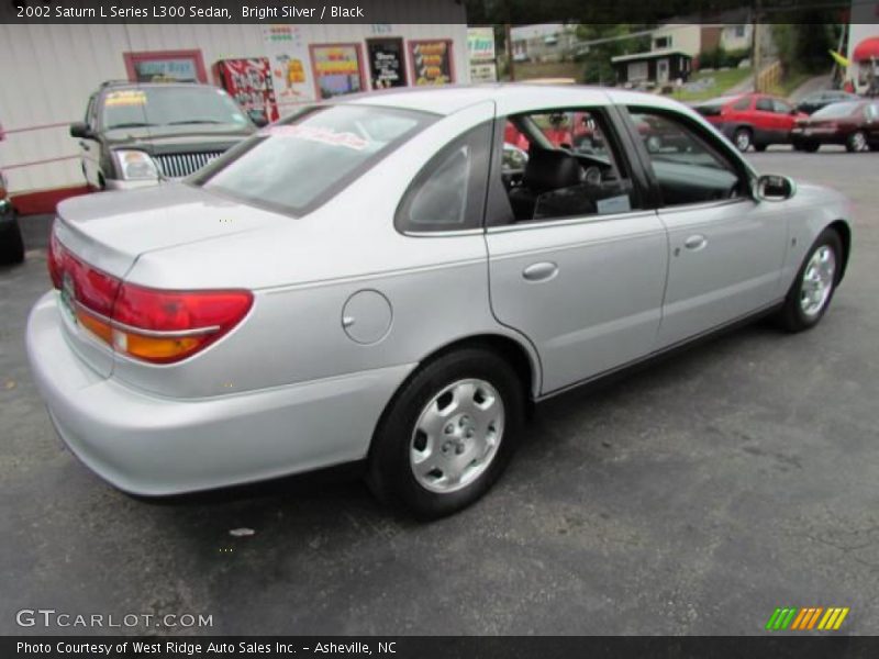 Bright Silver / Black 2002 Saturn L Series L300 Sedan