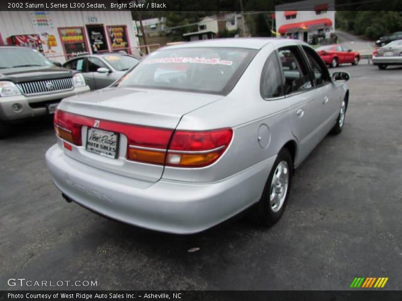Bright Silver / Black 2002 Saturn L Series L300 Sedan