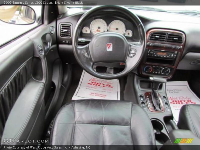 Bright Silver / Black 2002 Saturn L Series L300 Sedan