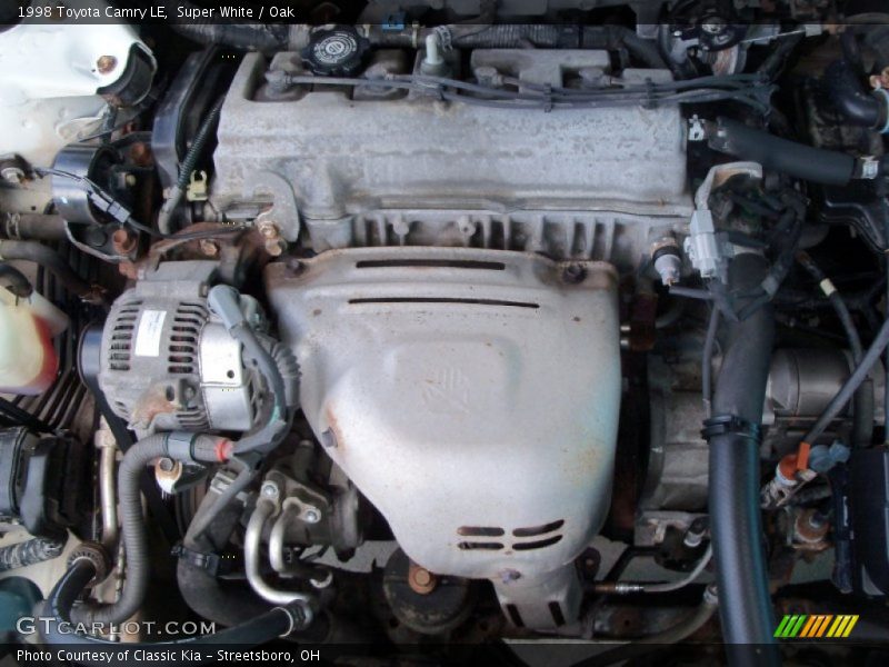 Super White / Oak 1998 Toyota Camry LE