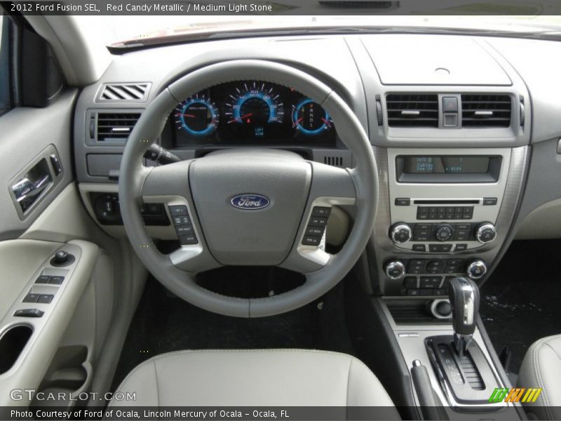Red Candy Metallic / Medium Light Stone 2012 Ford Fusion SEL