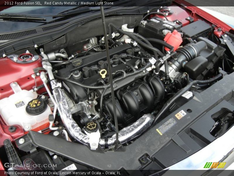 Red Candy Metallic / Medium Light Stone 2012 Ford Fusion SEL