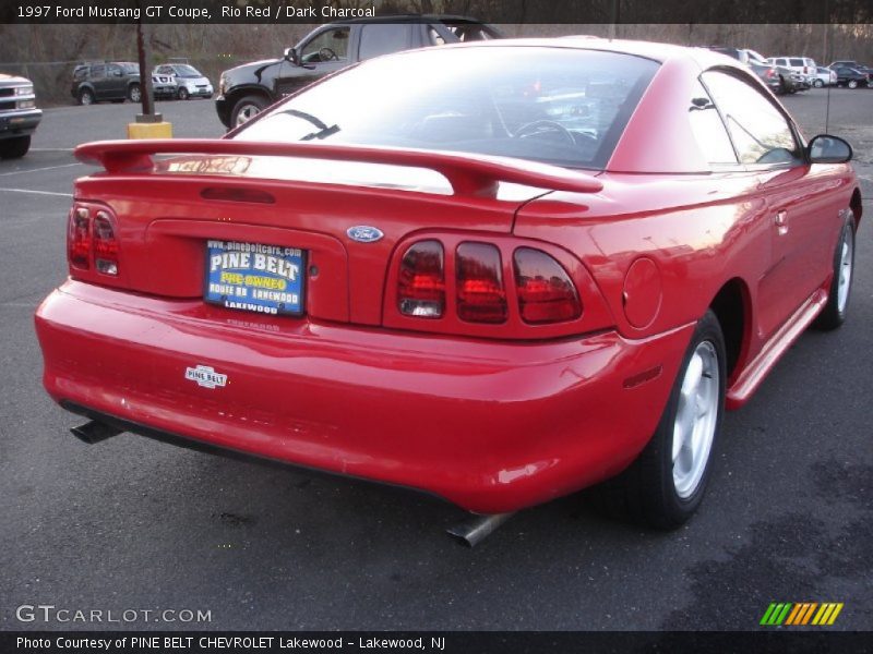Rio Red / Dark Charcoal 1997 Ford Mustang GT Coupe